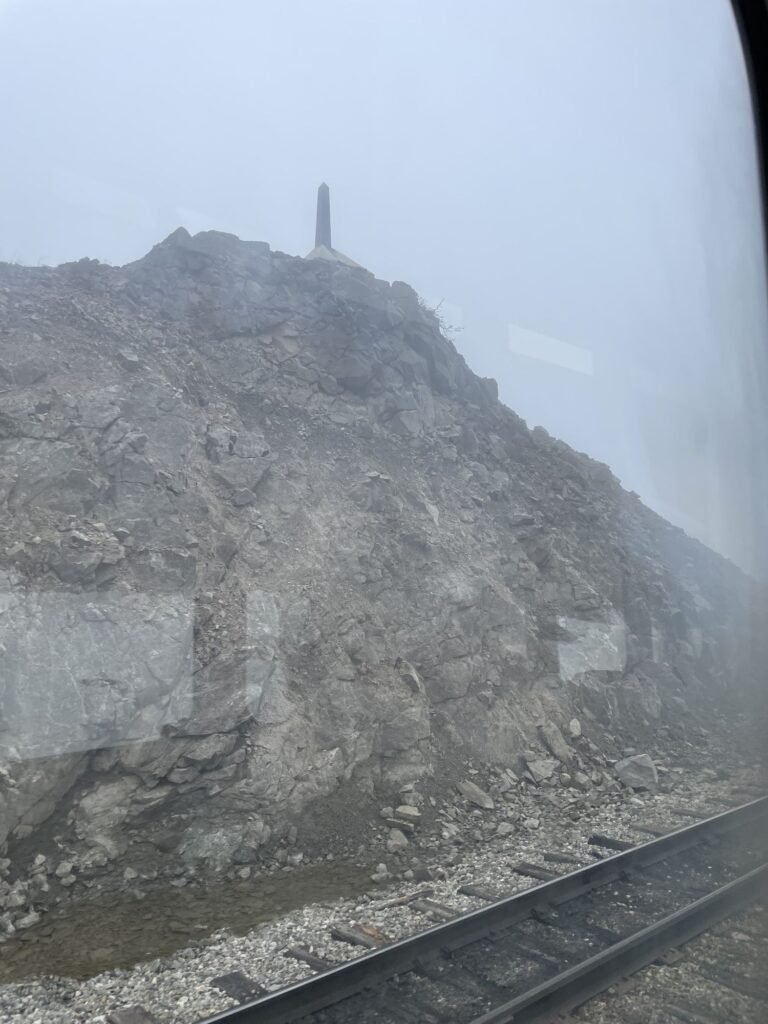Rocky mountainside in the mist along the White Pass route near the continental divide