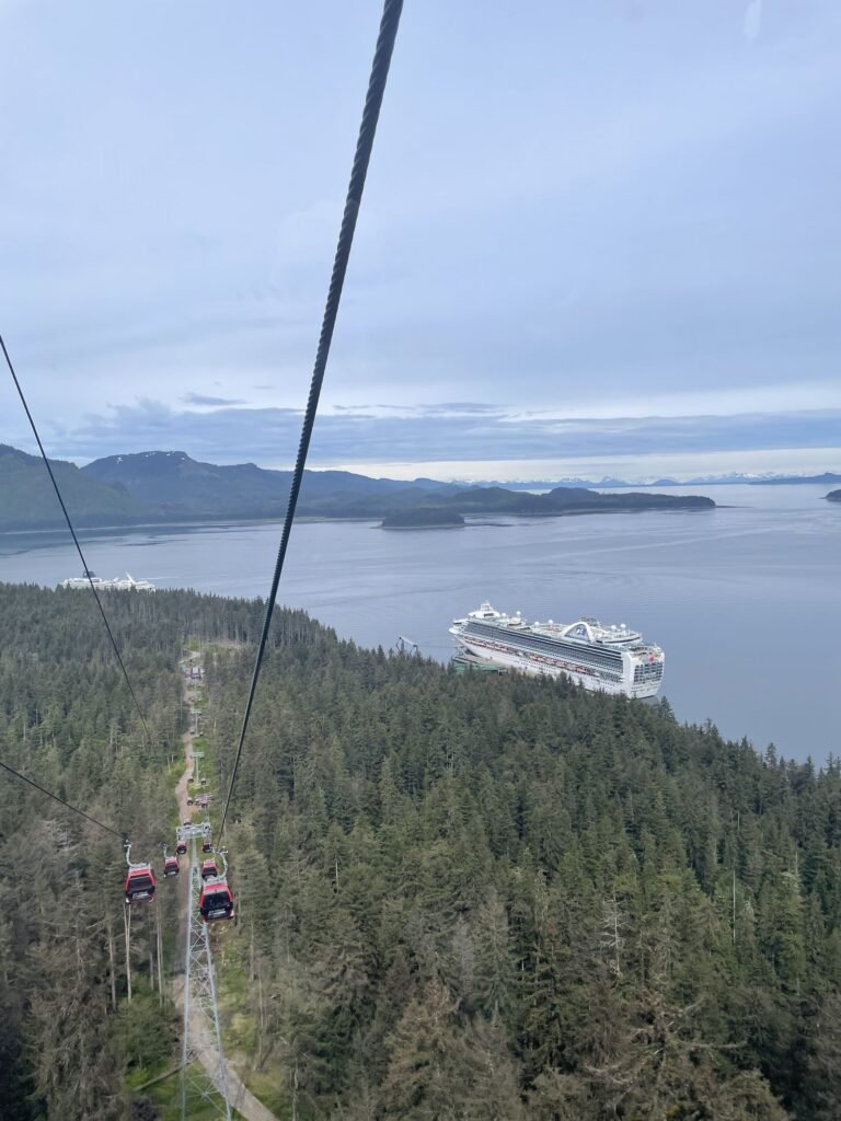 View from the gondola at Icy Strait Point, Alaska, with a cruise ship in the bay below