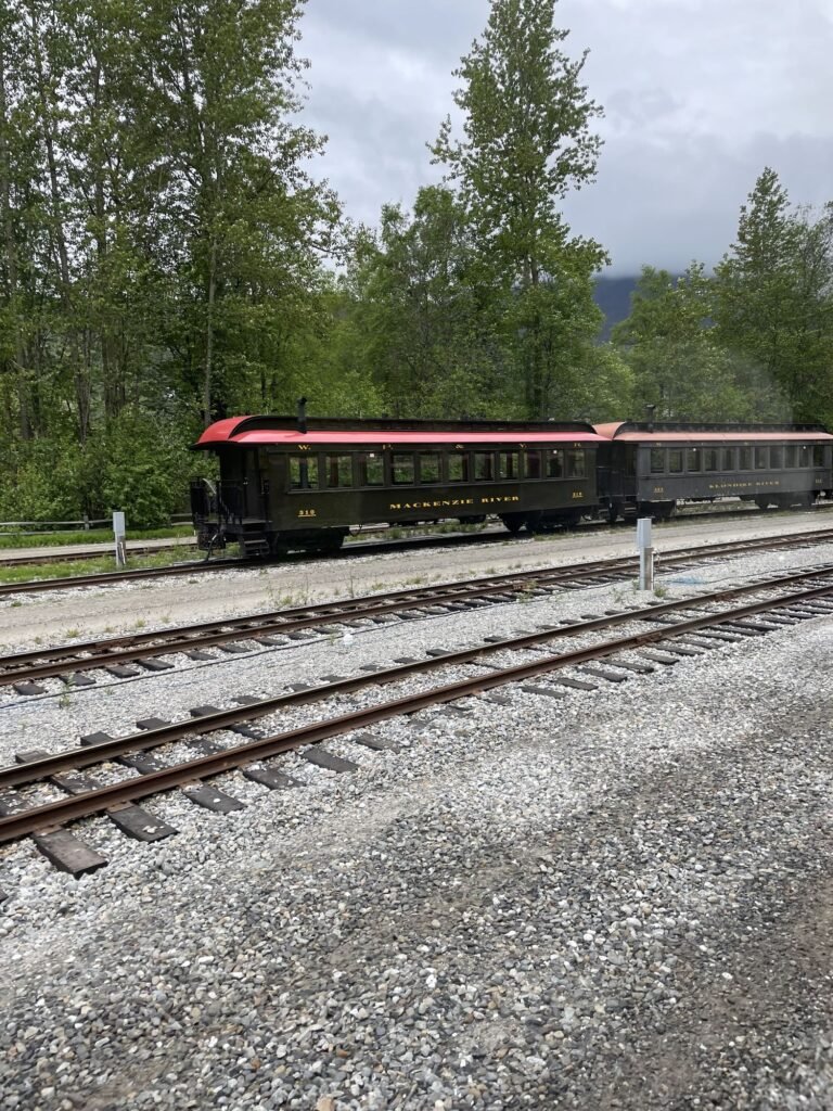 White Pass railcar waiting on the tracks in Skagway, Alaska